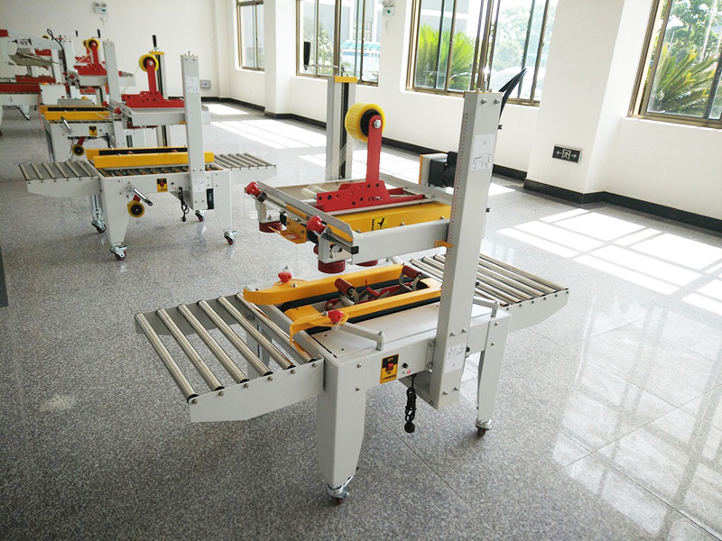 JS-FX500C 上下驅(qū)動手動折蓋膠帶封箱機